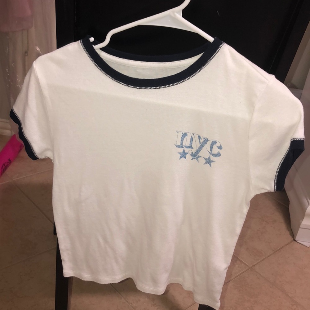 white “nyc” crop top